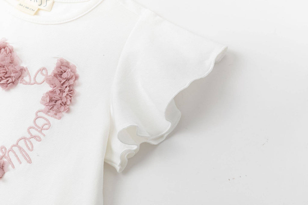 T-shirt met roze bloemblaadjes