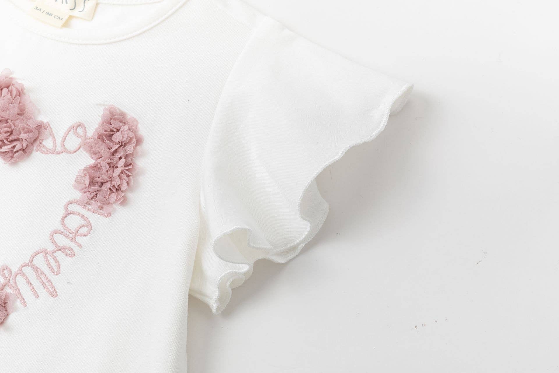 T-shirt met roze bloemblaadjes