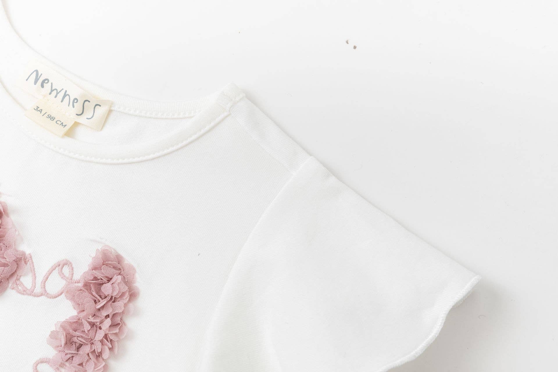 T-shirt met roze bloemblaadjes